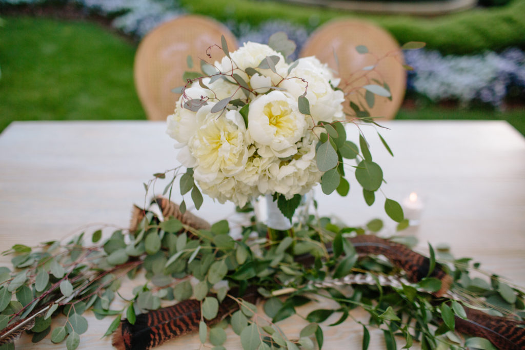 white floral arrangement on farm table