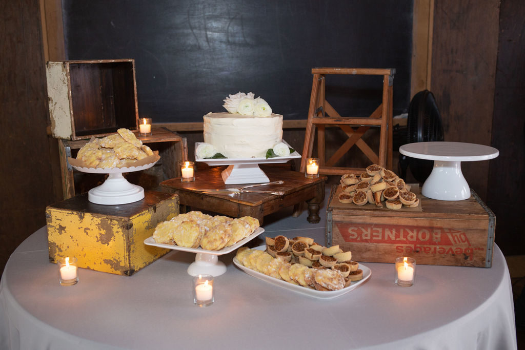 dessert table with lemon cookies, mini pecan pies